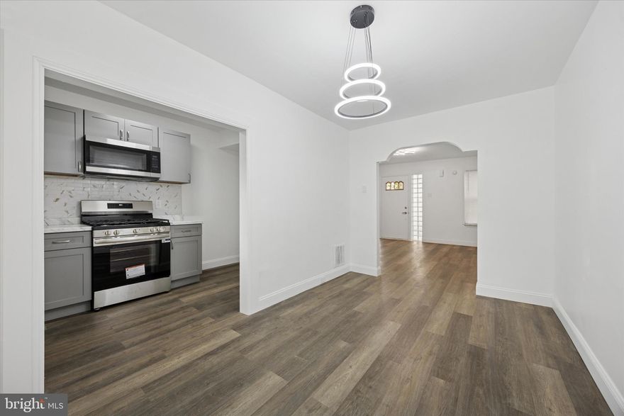 Beautifully updated 3BR/1BA home across from the Amazon Fulfillment Center and close to Philadelphia International Airport. Property may qualify for grants and closing cost assistance up to $10,000+ for eligible buyers! Features new LVP flooring, carpet, paint, fixtures, central air, and a renovated kitchen with granite counters, new cabinets & stainless steel appliances. Fenced yard and full basement for storage. Great for owner-occupant or investment. Includes a 1-year home warranty. Schedule today!