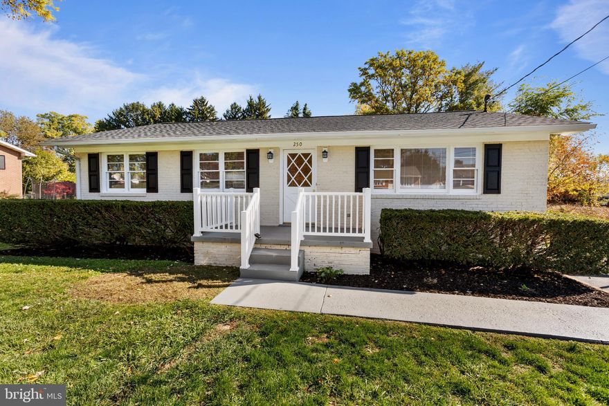 Adorable 4-sides brick rancher located on a peaceful and quiet street within walking distance to Downtown Charles town. This 3BR/1.5FB rancher with a fully finished basement has been fully renovated in the summer of 2023 including new roof, new HVAC, new hot water heater, new bathrooms, refinished hardwoods, new paint, and new kitchen appliances/flooring/countertops. The spacious lower level is open and bright with a fantastic recreation room, separate laundry room and storage area. The driveway can hold 4-cars; the spacious backyard is flat and easy-to-maintain - this is a pearl of a property!