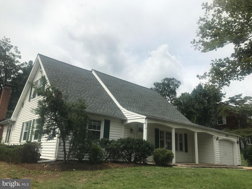 Cape cod with over 2400 sq ft of living space.  One car garage and large lot.  Huge great room/game room addition with fireplace and hardwood floors.  Lots of natural light.
