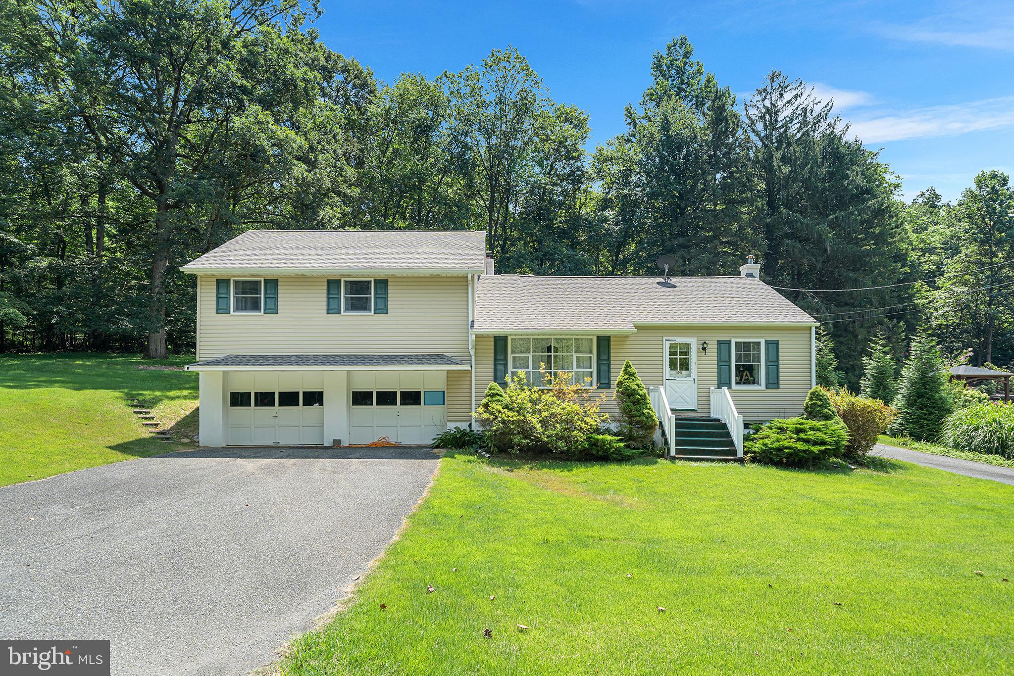 Charming 2-Bedroom, 2-Bath Split-Level Home in Earl Township. Set on a peaceful .48-acre lot surrounded by the natural beauty of Earl Township, this inviting split-level home offers comfort, space, and functionality. The main level offers a functional layout featuring a kitchen, dining room, and a cozy living room with a wood-burning fireplace. A full bathroom and access to a covered rear porch make this level perfect for both everyday living and entertaining. Upstairs, you’ll find two spacious bedrooms and a second full bath. The primary bedroom includes three closets—two of which are generously sized walk-ins—providing ample storage space. Additional highlights of the home include a two-car garage, paved driveway with parking for four or more vehicles, central air conditioning, low property taxes, oil furnace, and a new roof installed in 2021. Located in the desirable Boyertown Area School District, this well-maintained home offers comfort and privacy in a beautiful wooded setting.