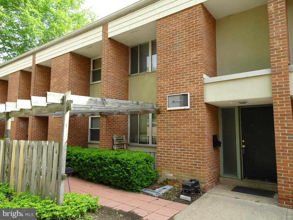Downtown and five blocks from Campus. Opportunity to own an all brick 3 bedroom condo with a delightful courtyard and hardwood floors. Excellent rental or possible residence/second home includes parking space. Condo fee includes snow removal, lawn/exterior maintenance, and refuse.