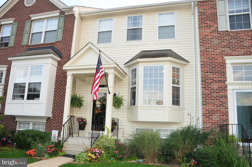 A True Gem!  3 Finished Levels with Many Updates. 4 Bedrooms, 3.5 Baths Gorgeous Hardwood Floors on Main Level  Open Floor Plan Large Eat-in Kitchen with Granite Counters and Tile Floor Updated Lighting Detailed Molding New Deck Overlooking Common Area, Fenced Backyard Master Suite with Vaulted Ceilings&Luxury Bath Finished Basement with Large Family Room 4th Bedroom Office Nook&Much More!