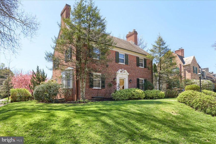 Stately red brick Colonial ideally situated in the heart of esteemed Homeland. This gracious four-bedroom, three-and-a-half-bath home offers timeless charm, generous proportions, and wonderful living spaces throughout. A large living room with fireplace and built-ins anchors the main level, while the formal dining room features a beautiful bay window and abundant natural light. An inviting sunroom with fireplace, built-ins, and direct access to the garden provides the perfect place to relax or entertain. The eat-in kitchen offers everyday functionality, and a rare attached garage adds convenience seldom found in the neighborhood. Outside, enjoy a spacious garden and patio ideal for outdoor dining, play, or quiet mornings. With recently refinished floors and fresh paint throughout, this special home is ready for its next chapter. A rare opportunity awaits at 115 Witherspoon Road.