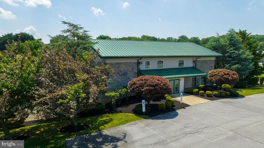 Why build when you can take advantage of this modern office building.  Ideal for various types of contractors or engineers.  Properties like this do not come along that often! 7,900 sq. ft. stand alone professional office building on 3.81 acres with ample parking, and room for expansion is located just off Route 724 and between business and Highway Route 222, in Spring Township. Designed, rebuilt and renovated with additions added at the turn of the century, circa 2001. This stone barn structure is now available for your growing company.  With two large adjoining conference rooms, one conference room has a working fireplace, 10 private offices, and a dozen other large cubicle workstations. This site is a prime location in a business complex which you enter from a traffic light intersection at route 724. Two men’s and two ladies restrooms along with a shower provide for staff convenience. Vaulted ceilings, abundant natural light, storage and service areas are all incorporated to offer a modern, well designed office space. This building and site offers flexibility and convenience to serve Berks County‘s and the Southeastern Pennsylvania market places. All at affordable numbers. Sitting on this oversized site, 330 Revere Blvd., provides for expansion, use changes, or both, options that otherwise may not be available with other real estate. Route 724 has a traffic count of 12,000 vehicles a day. The property is 0.3 miles from Route 222 which has 58,000 vehicles per day per the 2020 PennDOT traffic volume map. Don’t miss this great opportunity!  The owner had approvals to construct a "contractors" storage building on the site to serve work crews from the field.