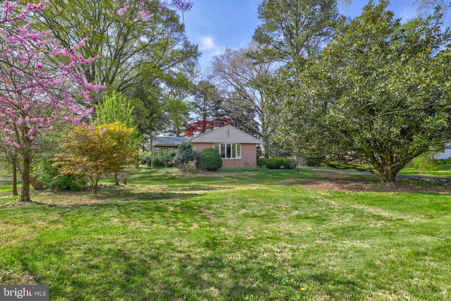 Welcome to this charming single-level home nestled on a serene half-acre lot, boasting hardwood flooring in Salisbury, Maryland. As you step inside, you're greeted by a lovely living room adorned with a wood-burning fireplace, perfect for cozy evenings, and a beautiful bay window that floods the space with natural light, creating a warm and inviting ambiance. Adjacent to the living room, you'll find a versatile dining area or reading nook, complete with built-in shelving and storage, offering a functional and stylish space for relaxation or entertaining. The kitchen features granite counters, sleek black appliances, and ample cabinetry for storage. A convenient breakfast area provides the ideal spot for enjoying your morning coffee or casual meals with family and friends. The spacious primary suite offers attached an half bath for convenience. Two additional bedrooms provide comfortable accommodations for family members or guests, while a full bath serves their needs. Step outside to discover the screened porch, offering panoramic views of the lush landscape surrounding the home. Whether you're savoring your morning cup of coffee or unwinding after a long day, this outdoor oasis provides the perfect setting for relaxation and enjoyment. Two outdoor sheds provide the perfect storage space for outdoor tools and hobbies. With its seamless blend of comfort, and functionality, this home offers privacy where every day feels peaceful.