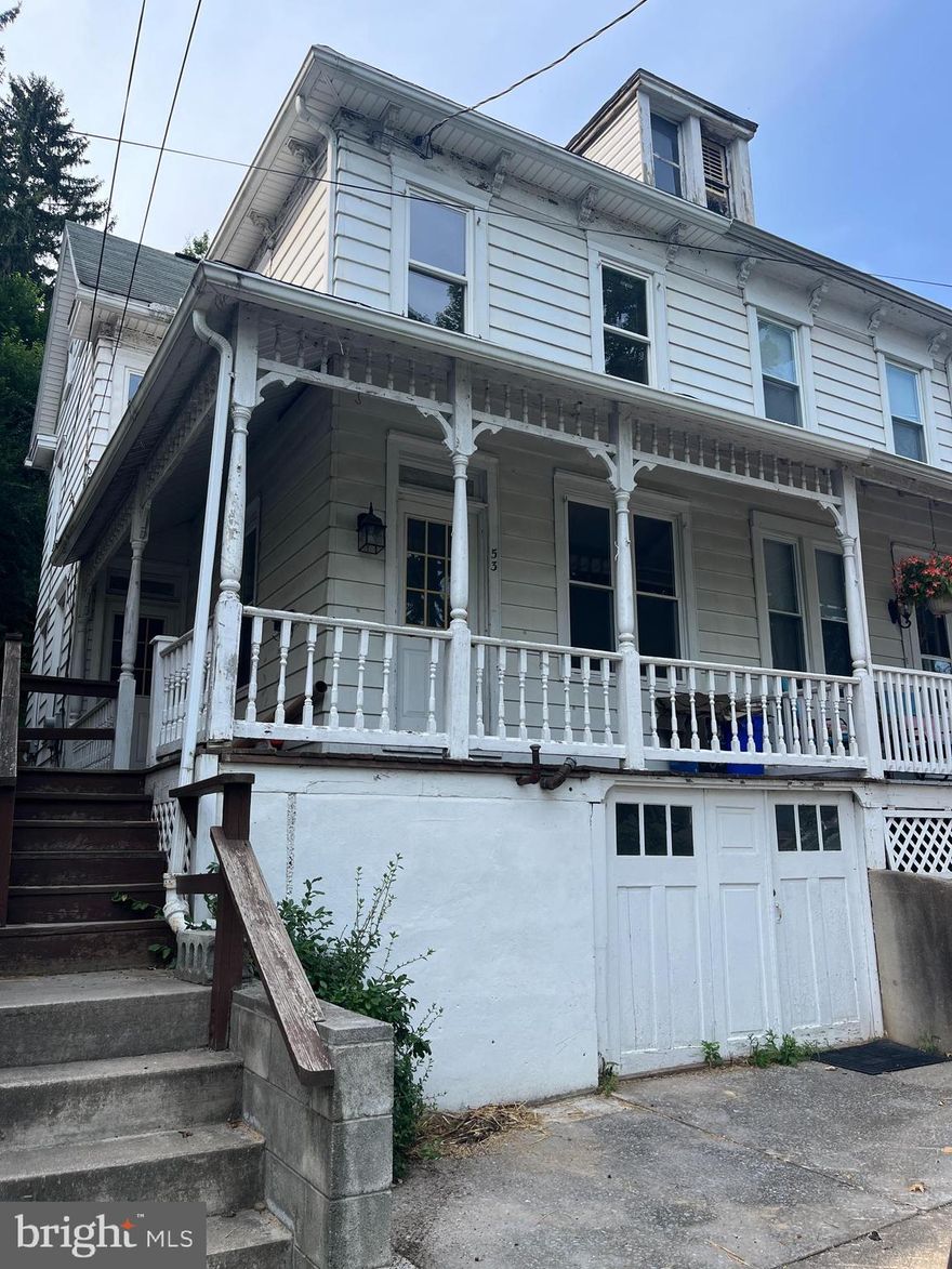 Half-Double located 1 block from Downtown Lewistown.  The property has 1,434 above ground square feet with a wrap around front porch and a large backyard.  The basement level is easily accessible from the front of the property with ground level access.  The living room, dining room, kitchen, and a bonus room are located on the first floor.  Two bedrooms, a full bathroom, and a small storage room are located on the second floor.  Call today to schedule a tour of the property.