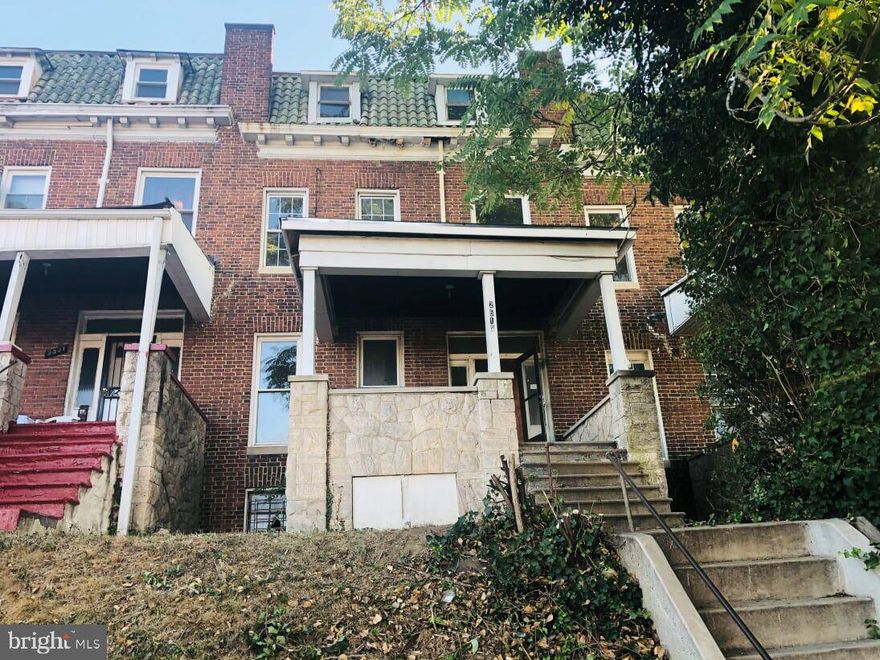 Wonderful opportunity to own this all brick porchfront rowhome in Parkview/Woodbrook neighborhood.  Enjoy nice room sizes, wood floors, and eat in kitchen. Use the basement for added storage or finish off for additional space. Best location - a few blocks away from shopping centers, restaurants and transportation.