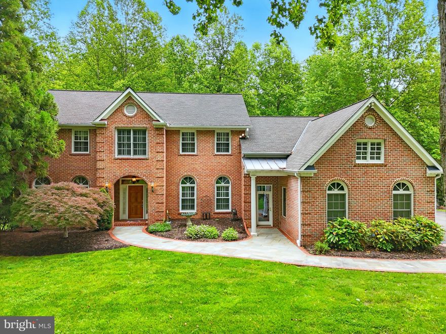 Luxury Equestrian Estate on 5 Acres – A Rare Clifton Gem!
Welcome to this breathtaking 5-acre luxury estate, a horse lover’s paradise nestled in the heart of Clifton. Designed for those who seek elegance, comfort, and functionality, this stunning 4-bedroom, 4-bathroom home blends timeless craftsmanship with modern upgrades, offering the perfect retreat from the everyday hustle.

As you step through the solid mahogany front door, you’re greeted by an inviting spacious floor plan, featuring hardwood floors throughout the main level and built-in shelves that add charm and practicality to many rooms. The spacious primary suite is a true sanctuary, while the sunroom and large family room provide the perfect spaces to relax and entertain.

The updated chef’s kitchen boasts ample storage, a built-in refrigerator, and a large pantry, making meal prep effortless. Upgrades are found throughout the home, including a full-house generator for peace of mind.

For equestrian enthusiasts, this estate is a dream come true. The property is fully fenced and includes multiple horse gates leading to the Morton barn, which features:
✔ Three 12x12 stalls (each with lights and a fan)
✔ Tack room and feed room
✔ Hot water heater and shower stall
✔ New ceiling fan for added ventilation

Beyond the barn, mature trees frame the property, creating a serene, private retreat. The luxurious deck with built-in lighting invites outdoor entertaining, while trails entrances on the street leading to Fountainhead Park and Bull Run Marina make this an outdoor enthusiast’s haven.

Additional features include a workroom in the basement, a three-car garage, and upgrades throughout.

Experience the best of luxury country living with modern conveniences, all just minutes from major commuter routes, charming shops, and fine dining. Don’t miss this rare opportunity—schedule your private tour today!

Photos have been updated - for a full house tour and video of the property, see here: https://view.spiro.media/order/54da88b1-ef65-4ea4-05cb-08dd9469710b?branding=false