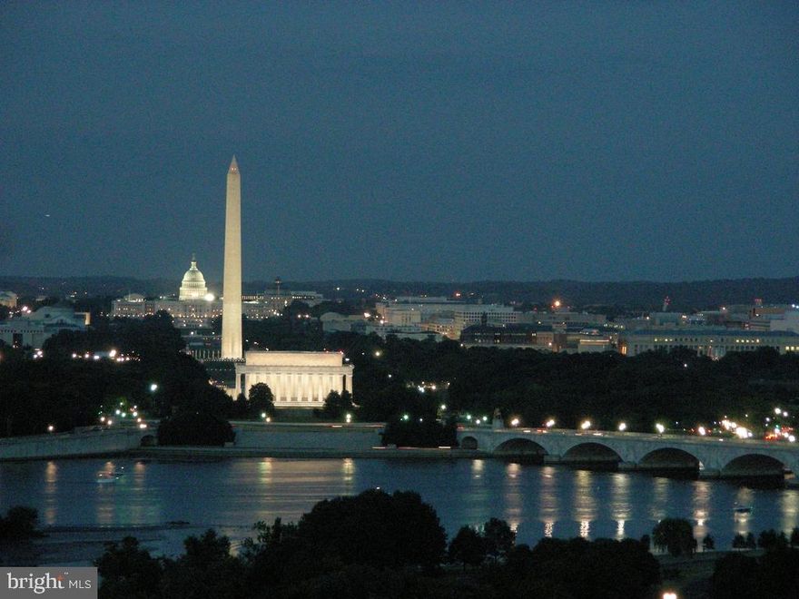 The view doesn't get any better than the vista from this 11th floor duplex unit of the DC skyline, the river and all the monuments.  The living room has a 13 foot ceiling and a wall of glass that opens to the large balcony that is perfect for outdoor entertaining. The living room has a built in floor to ceiling wood wall unit with a table that pulls down to create work space or dining space. The dining room has two mirrored walls and an extra walk in closet that can be used for storage or for a pantry.  The kitchen is open to the dining room  and has a breakfast bar with seating. The bedroom has a western exposure and has a scenic view of the Arlington skyline. The rental includes utilities and garage parking. Prospect House is an 11th story condo with 24 hour desk service, security, a heated olympic style pool, gym and a convenience store and dry cleaners.