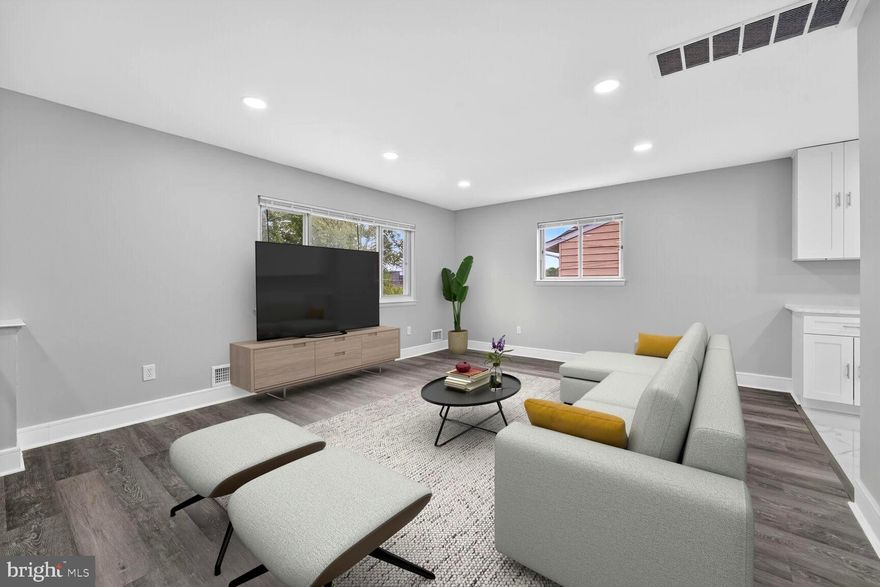 Beautifully Renovated 5BR/3BA Home with Bonus Room & Dual Living Areas

Fully renovated and move-in ready! This spacious 5-bedroom, 3 full bathroom home features modern updates throughout, including new gray vinyl flooring and updated lighting in every room. The kitchen is a standout with white cabinetry, stunning quartz countertops, a large quartz island, and plenty of prep and storage space—ideal for any home chef.

Enjoy two separate living rooms, perfect for entertaining or relaxing, plus a formal dining room with direct access to the back deck for easy indoor/outdoor living. The oversized primary suite includes a beautifully updated bathroom with white countertops and elegant tile flooring.

A dedicated bonus room with a private entrance offers great flexibility for a home office, guest space, or studio.

Additional features include:

New HVAC systems

Spacious layout with 5 true bedrooms

Modern, neutral finishes throughout

Large lot with outdoor entertaining potential

Don't miss this turnkey home with space, style, and functionality—schedule your showing today!