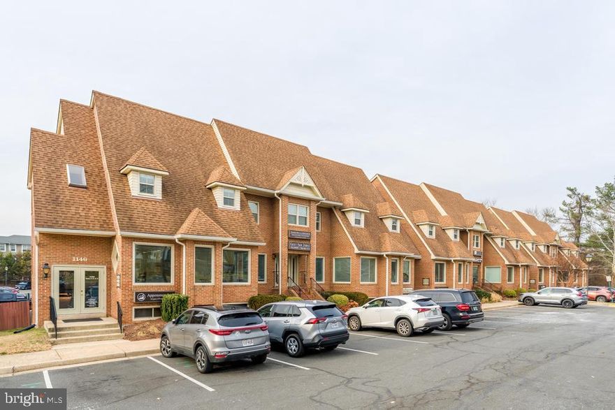 Rare opportunity to acquire an upscale professional office condominium in the highly desirable Leigh Corners Office Park in Great Falls, offering exceptional flexibility for an owner-user or investor. Unit G is accessed through a shared interior corridor that immediately conveys a polished, contemporary atmosphere with modern entry doors, professional paint, abundant natural light from skylights and windows, entrances at both ends, and curated wall art that creates an inviting and refined professional environment. Natural light is a defining feature throughout the property, with multiple skylights illuminating both the corridor and the interior suite. At approximately 1,250 square feet, the condominium offers an efficient and thoughtfully designed layout ideal for a variety of professional service firms, featuring a double entry door, three spacious private offices with windows, a welcoming reception area well suited for client meetings and waiting, and a central hallway with ample space for filing or additional storage. Large windows and skylights create a bright, uplifting work environment, complemented by beautiful wood flooring throughout that remains in excellent condition and contributes to the suite’s clean, modern aesthetic. Additional features include a stylish restroom with sleek vanity and a utility room with janitor sink and storage. Property highlights include building signage availability as well as monument signage at the main entrance, ample free parking with convenient customer parking in front and additional employee parking at the rear, and the suite being vacant and ready for immediate occupancy. Each condominium at Leigh Corners is individually owned, with professional management overseeing the common areas. The property enjoys a premier Great Falls location with excellent accessibility from Route 7/Leesburg Pike via two access points and is just minutes from the Great Falls Village Centre, home to the popular Farmers Market, Concerts on the Green, and numerous community events throughout the year. Nearby amenities include Safeway, Starbucks, restaurants, banks, the post office, and the Great Falls Library. Great Falls is ideally positioned between Tysons and Reston, with convenient access to Dulles International Airport, the Silver Line Metro, and I-495, while the surrounding technology corridor is home to many leading IT companies and major corporate headquarters.