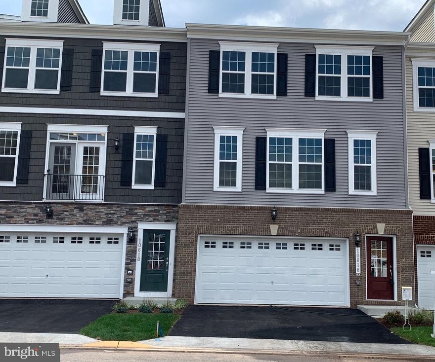 Built on 2019, luxury Stanley Martin 2 Car Garage 24 wide 3 level large townhouse , 3 Bed room, 3 full bath, totally finished Basement. Stainless steel appliances, eat-in Island, real deck and half bath and hardwood flooring on the main level.Community parking lot at front of this townhouse.Community tot lots, central park with splash pad, gazebos through out the neighborhood. 2 miles to old town Manassas and VRE station, 5 minute to shop at Signal Hill shopping Center and Warmart Store. Near Rt28, Prince Williams Parkway, Manassas Airport.