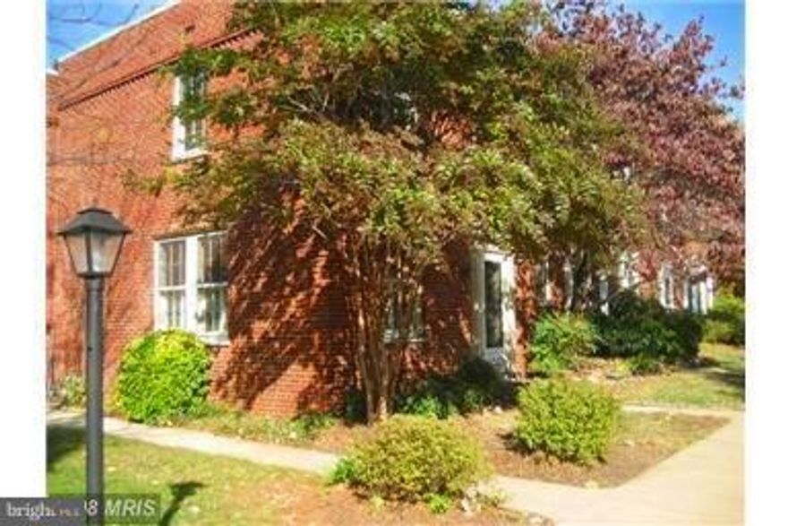 Large 2 BR 1086 Sq.ft. End Unit with 3 exposures. Amazing Kitchen renovation with no expense spared. True wood burning fireplace (only 2 or 3 in Village). Great Deck. Parking in front- so easy to move & bring groceries home! So close to vibrant pike yet peaceful! Pets case by case. No weight limit. Pool, tennis, bus to Pentagon & Metro. Walkscore 86! Can provide furn. Extra storage unit conveys.