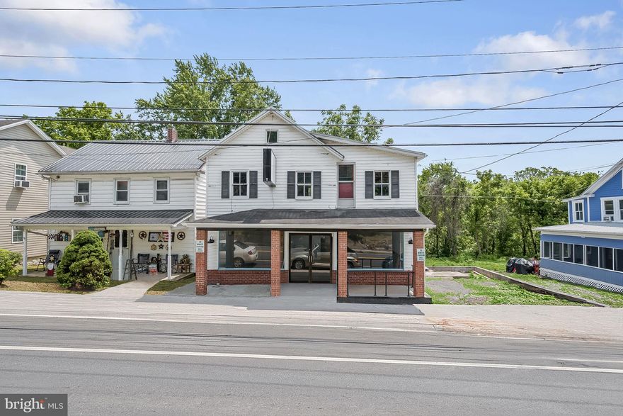 Sold "AS IS".  SQUARE FOOTAGE IS INCORRECT .  ESTIMATED SQ FT FOR TOP FLOOR APARTMENT IS 697.  ESTIMATED SQUARE FOOTAGE FOR MAIN LEVEL IS  1,393.  ESTIMATED ABOVE GROUND SQUARE FOOTAGE IS 2,090

Introducing 119 East Main Street in Hancock an As-Is Charmer. Located in downtown Hancock, offering in-town living and all the amenities and conveniences it affords, all are just steps away; Restaurant – Apartments – Retail;  Being offered in its current "as-is" condition. It presents a unique opportunity for those looking to put their personal touch on a property and make it their own!