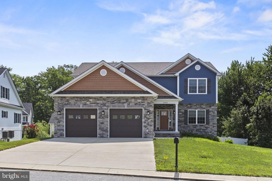 Built in 2020 by Great Mills Trading Post, this beautifully upgraded 4-bed, 2.5-bath colonial in Pembrooke offers over 2,600 sq ft of living space! The 1,200 sq ft of unfinished basement with rough-in plumbing is perfect for future expansion and equity growth. This home features recently installed vinyl plank flooring and a white vinyl privacy fence on a nearly 1/4 acre lot. Move-in ready and packed with potential!  Ask your agent or lender for details on how to take advantage of the assumable USDA Mortgage!