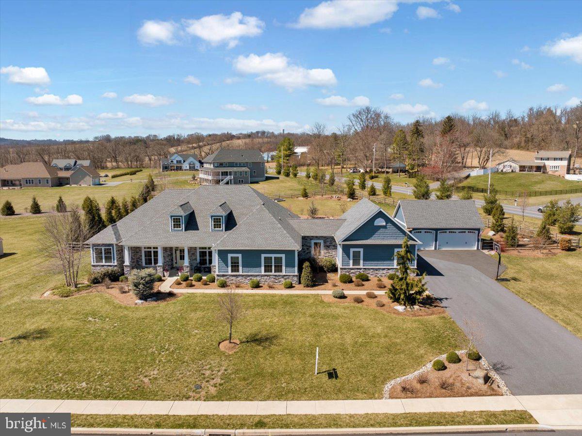 Nestled in the sought-after Green Valley Crossing community, this property offers the perfect blend of luxury and comfort. This stunning home features an in-ground pool, fenced-in yard, and a newly finished in-law suite—ideal for extended family or guests. The open-concept layout boasts vaulted ceilings, a gourmet kitchen with a central island, and a spacious master suite and custom tile shower. Enjoy outdoor living on the 10x22 patio and a large yard for hosting and entertaining. The property also includes a three-car attached garage and a three-car detached garage. Both garages have a Tesla EV charger inside. The house is also equipped with solar panels that covers the cost of the energy bill with a Tesla battery for back up energy storage . Located in the Wilson School District, this home is a true gem! Don't miss out, schedule a tour today!