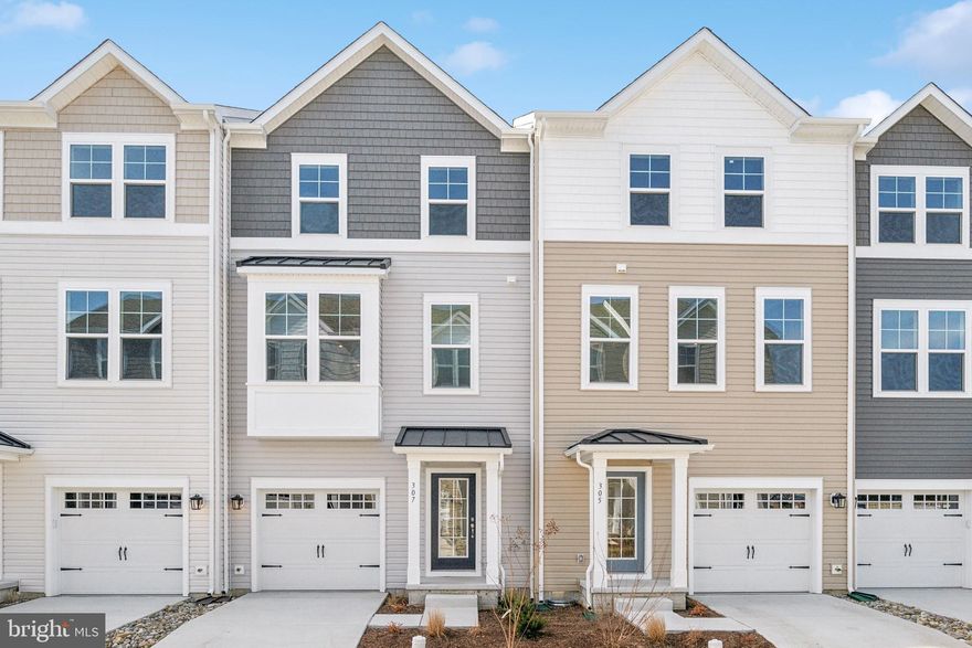 Final opportunity to buy a brand new home in the Deep Harbour community! We are down to our last few homesites! MOVE IN READY!!! This 3-level townhome offers water views of Cambridge Creek!  Coastal vibes abound  with hints of modern flair in an open-concept design. Enjoy an entry-level recreation room, a beautifully appointed kitchen that flows directly into your great room, and a private 3rd-level featuring 3 bedrooms – including the spacious primary suite and bath! Experience the charm of this home featuring a kitchen with upgraded countertops and cabinets, a luxurious walk-in shower in the primary suite, and a versatile recreation room for leisure and entertainment. Enjoy WATER VIEWS from the 18-foot deck conveniently located off the kitchen for easy entertaining! Take a dip in the community pool or stroll along the Riverwalk, or take a short walk into the town of Cambridge where you can enjoy waterfront restaurants and unique shops. Experience the lifestyle you have been dreaming about in the beautiful, gated Deep Harbour Community.  Come visit today!