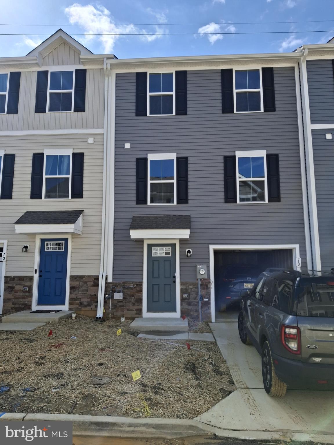 Brand-New 3-Bedroom Townhome in Windy Hill Towns – Be the First to Live Here!
Welcome to 10 Fieldcrest Aly, a stunning newly built townhome in the highly sought-after Windy Hill Towns community of Gloucester Township! Constructed by Ryan Homes and delivered in February 2025, this contemporary residence offers 3 bedrooms, 2.5 bathrooms, and an attached 1-car garage with additional driveway parking. Be the very first occupant and enjoy the comfort of a brand-new home!
Home Features:
- Ground Floor Entry – Step into a welcoming foyer with direct garage access and a versatile family room or office space.
- Open-Concept Main Level – High ceilings and recessed lighting enhance the spacious design, while the gourmet kitchen boasts 42” cabinetry, stainless steel appliances, and a large dining area—perfect for entertaining.
- Expansive Living Room – A bright, inviting space to relax or host guests.
- Convenient Half Bath – Located on the main level for added ease.
- Upper-Level: This includes two well-sized bedrooms, a full hallway bath, and a primary suite with a walk-in closet and private ensuite bathroom.
- Laundry on the Upper Level – Enjoy easy access to the washer and dryer near the bedrooms.
- Located just a short drive from shopping, dining, and major highways, this home offers the perfect blend of modern living and convenience.
Don’t miss your chance to be the first to call this stunning townhome your own—schedule a tour today!