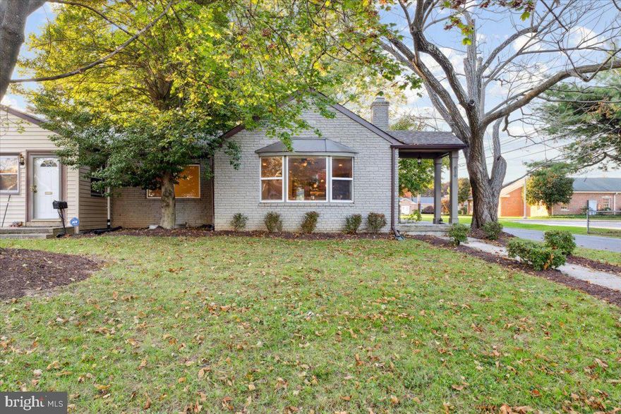 Welcome to this beautifully maintained home on one of Frederick’s most desirable streets, where main-level living meets a rare “villa” style functionality right in the heart of downtown. Step inside to gleaming hardwood floors and an airy, open layout that connects the family room to a chef’s kitchen. Outfitted with stainless steel appliances, granite countertops, a stylish backsplash, and a spacious peninsula, the kitchen is perfect for cooking and gathering. It seamlessly opens to a fully fenced backyard with a raised deck—ideal for hosting, gardening, or simply unwinding in your own private oasis. The main level is filled with natural light and warmth, featuring a cozy wood-burning fireplace and the convenience of main-level laundry—an uncommon perk in downtown Frederick! The primary suite offers a sleek en-suite bathroom with a glass shower, and two additional bedrooms plus a full bathroom complete the floor. The fully finished lower level provides versatile space for a rec room, guest suite, or home office, with a fourth bedroom/office and a full bathroom. It also features walk-up access to the backyard, making it a functional and flexible addition. Outside, enjoy your spacious, fenced backyard shaded by mature trees—perfect for outdoor living. The property includes a two-car driveway with an electric vehicle charger hookup, plus the potential for a one-car garage. Best of all, you’re just a five-minute walk from the Common Market Coop, Frederick Health Hospital, and a variety of local shops and restaurants. With easy access to major commuter routes like R15, I70, and I270, this home offers both charm and convenience. Welcome home!