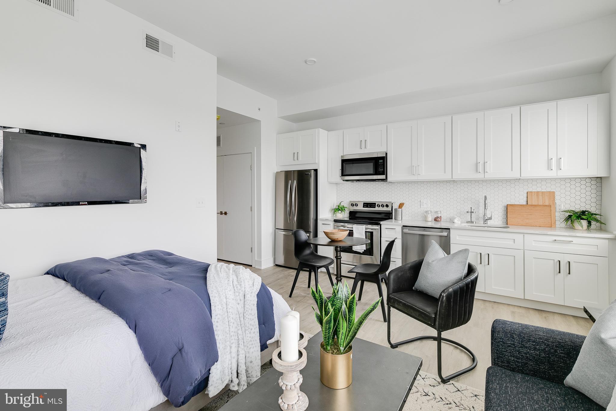 *Available NOW!*
Don’t miss the chance to live in a beautiful 52-unit apartment building at 2201 Washington Avenue! Situated in the charming Graduate Hospital neighborhood, this building is near many local conveniences, restaurants, and attractions that are sure to make for an enjoyable living experience. The walkability is unparalleled as you can reach the Schuylkill River Park, larger shops like Target and Sprouts Farmers Market, plus mom and pop businesses like The Sidecar Bar & Grille and Loco Pez, all by foot! Public transit is also accessible via Washington Avenue and Broad Street, and you are close to I-76 for zipping in and out of the city. This sunny studio has a spacious layout and modern finishes including central AC, in-unit laundry, as well as recessed lighting. Natural light is also abundant with multiple windows. The kitchen is beautifully designed with white cabinetry, quartz countertops, stainless steel appliances and honeycomb backsplash tiling. The contemporary full bathroom features a shower/tub and sleek vanity with a unique lighted mirror. Finally, enjoy building amenities that include a shared roof deck with stunning city views as well as a convenient bike storage room.
Lease Terms: Generally, 1st month, and 1 month security deposit due at, or prior to, lease signing. Other terms may be required by Landlord such as last month’s rent upfront. $65 application fee per applicant. electricity, gas (if applicable), cable/internet and $10/mo technology fee. Water is a flat monthly fee of $60. $25 service fee plus cost of the air filter will be charged quarterly for routine air filter replacement. Landlord Requirements: Applicants to make 3x the monthly rent in verifiable gross income, credit history to be considered, no evictions within the past 5 years, and must have a verifiable rental history with on-time rental payments. Exceptions to this criteria may exist under the law and will be considered. Cosigners will be considered.
*Price reflects the net effective rent when a 1-month credit is applied at $1,295/mo.
*1 dog OK (max 45 lbs), NO cats. $50/mo pet rent required.
*Photos of a similar unit in the building.