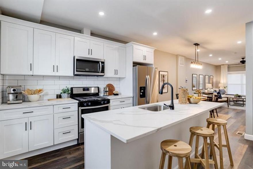 Welcome to 3011 Pulaski Hwy — a beautifully renovated 4-bedroom, 2-bath townhome offering the perfect blend of comfort and modern style. Step inside to an open-concept main level featuring a bright living room, dining area, and a sleek kitchen with quartz countertops, stainless steel appliances, and upgraded cabinetry. Luxury vinyl plank flooring flows throughout for easy maintenance and durability.

Upstairs, you’ll find three spacious bedrooms and a fully updated bathroom with tile finishes and a modern vanity. The finished lower level provides additional living space, ideal for a guest room, office, or recreation area, plus a second full bath and laundry hookups.

Enjoy convenient city living with easy access to Johns Hopkins Hospital, Patterson Park, local dining, shopping, and commuter routes. This move-in ready home offers style, space, and convenience in one of Baltimore’s most accessible locations. Photos are from previous listing.