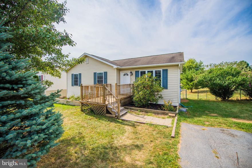 Beautifully completely remodeled 3 bedroom, 2 bath  ranch home.  Granite kitchen counter tops and island.  Mostly finished basement offers large extra living space..  Unfinished area for washer and dryer and storage.    Newly installed ceiling fans. Deck leads to a fully fenced yard.  This home is move in ready.