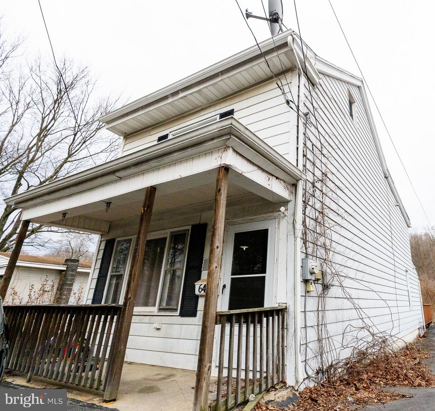 Located in the heart of Port Carbon, 640 Fifth St is a well-maintained three-bedroom home with a flexible bonus space and two full bathrooms, offering 1,400 square feet of living space within the St. Clair Area School District. Built in 1900, this two-and-a-half-story conventional-style home retains its classic charm while providing modern conveniences. The spacious layout includes a welcoming open porch, a full walkout basement for storage or potential additional living space, and a large deck perfect for outdoor entertaining.  

Upstairs, the home features two private bedrooms, along with an additional room that provides walkthrough access to the main bedroom, making it ideal as a nursery, office, or sitting area. The main bedroom also connects to a finished attic, which could serve as a bonus room, playroom, or additional storage space.  

Situated on a 0.13-acre lot with 43 feet of frontage, this home features a low-maintenance aluminum siding exterior, oil-fueled hot water heating, and public sewer and water services. The property is easily accessible via a conventional road and is conveniently located near major roads, shopping, and local amenities.  

This home offers updated charm and versatile living space, making it an excellent opportunity for both homeowners and investors. Schedule a showing today!