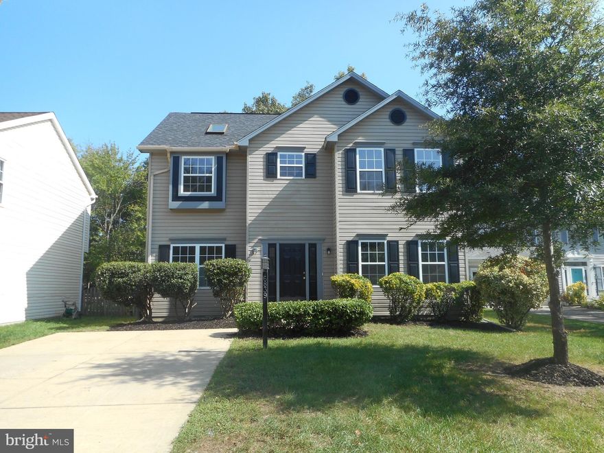 Welcome home to this perfect blend of functionality and charm.  As you enter you are greeted with a nice size formal living room on the right and a formal dining room on the left.  The kitchen offers plenty of room to move around with stainless steel appliances and a new refrigerator plus a cozy breakfast nook area.  The family room is off of the kitchen with a wood burning fireplace and french doors that leads to the rear deck.  The upper level offers a primary bedroom with two closets with ample space, and a primary bath with a separate shower an  soaking tub with jets and a double bowl vanity.   There are three additional nice-sized bedrooms plus hall bath.   This home has been completely painted with all new flooring.   Centrally located and is close to shopping and entertainment and offers easy access to the Washington DC metro area and National Harbor.