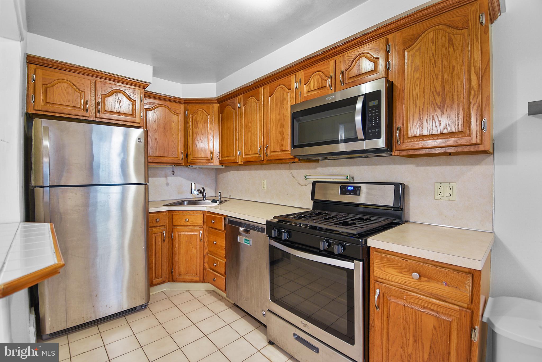 Introducing 672 Rively Ave, an interior unit townhome in Darby Township and Southeast Delco School District. This super clean home offers beautiful hardwood flooring throughout. Main floor Living room with ceiling fan, dining room with ceiling fan and kitchen with stainless steel gas stove, microwave, dishwasher and refrigerator. Dining room slider leads to covered and screened in deck, outfitted with a ceiling fan. Upstairs are 3 bedrooms and a full bathroom. Basement is finished with recessed lighting, powder room, laundry area and a walkout rear exterior door. Parking available in the one-car garage, on the one-car driveway or in the street. Central a/c, front patio and backyard storage shed. Tenant pays electric, gas, water, cable/internet if desired and renters insurance. Two (2) pets permitted with owner approval plus monthly pet fee of $25 per month. Available for immediate move-in. $49.99 application fee per applicant over 18 years old for credit/criminal/eviction check. 600 minimum credit score and verifiable income of at least $6,600/month required. $100/month discount for 24 month lease. Prospective tenants are welcome to apply anytime on Rentspree, contact agent for link.