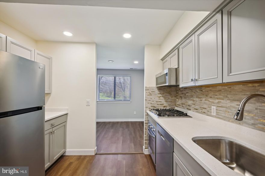 Ground Floor Unit, Great Location! 1 Bed 1 Bath Condo Is Close To It All! Completely Updated From Top To Bottom With Recessed Lighting, Hard Surface Flooring, Fresh Paint, SS Kitchen Appliances, Quartz Countertops, Updated Cabinets, Updated Shower Tile & Vanity, Too Much to List! Great For Commuters to Baltimore, DC, Ft Meade, & Close to Everything... Parks, Bike Trails, Shopping, 175, 95, 32, & 29. Must See Today!