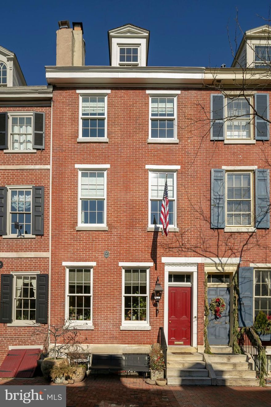 Grand historic sun drenched 4 bedroom, 2.5 bath home built in the 1800's, beautifully and tastefully renovated and located on one of the most iconic tree lined streets in Philadelphia. Custom elegance greets you upon entering this exceptional home, with wide plank solid wood mahogany floors, an open living and dining room, and a handsome mahogany library, all on the first floor. Contemporary kitchen offers custom white oak cabinetry, Carrera marble countertops, Miele suite appliances, Lacanche range, custom lighting and more. Second floor master suite is to die for, complete with a cherry cabinet dressing room and a luxurious 4 piece bath with Waterworks fixtures. Additional 3 bedrooms are all spacious, plus 2nd floor laundry room and a 4th floor flex space. Outdoor spaces include a lush garden, a vertical garden and a lovely roof deck. Impeccably finished lower level makes another bonus entertainment room, plus a storage area. This home offers impeccable attention to detail and custom features throughout. Seller offering a one year parking credit. Approx 3197 sq ft.