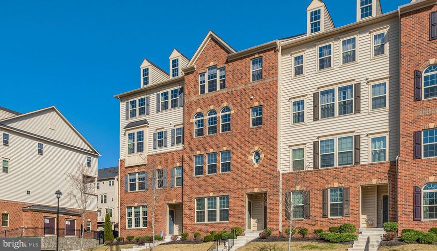 Here’s a wonderful home that delivers plenty of living space infused with the up-to-the-minute luxuries and amenities buyers seek today! High ceilings, transom windows, rich wide-plank flooring, modern hardware and fixtures—all ready for timeless enjoyment for years to come. Open floor plan presents a sense of spaciousness that incorporates the full dimension of the main level! Wall of transom windows in the Living and Dining area serve up western views of the Shenandoah mountains. Enjoy beautiful sunsets that change with the seasons. Designer Kitchen anchored by a massive center island doing double duty with sink and breakfast bar. Tall ample French-white cabinetry complements the granite countertops and stainless appliances. Great Room and Breakfast nook allows all to gather! Excellent floor and wall space accommodates multiple furniture groupings to fit any lifestyle. Great covered Porch for outdoor enjoyment. Master Suite, set under tray ceiling, enjoys windowed sitting nook and TWO walk-in closets. En-suite luxury Bath has two granite vanities, deep soaking tub and step-in shower with bench. Two secondary Bedrooms, each with double reach-in closets, share a Bath with rare (but smart!) double sink vanity and tub/shower. Unexpected convenience of the upstairs Laundry room with built-in cabinets and front-load stacked washer/dryer duo. Garage outfitted with value-added overhead shelving. Garage and Driveway parking plus ample guest parking along Racing Sun Dr.  Virginia Manor is a neighborhood within the master-planned community of Dulles Farms. Top-notch Amenities include Clubhouses, pools, fitness centers, sport courts, tot lots and miles of walking paths.  Seller will need a 30-60 day rent-back.