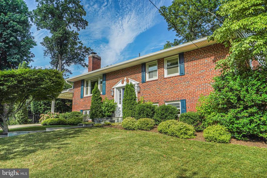 Welcome to your dream home in the heart of Falls Church! This beautiful single-family residence offers the perfect blend of modern luxury and timeless charm, situated in the highly sought-after McLean High School district in Westwood Park. 

As you step inside, you'll be greeted by a beautifully renovated kitchen that is truly the heart of the home. Featuring stainless steel appliances, sleek countertops, and ample storage, this kitchen is chef ready. The three renovated bathrooms exude elegance and quality, ensuring a spa-like experience in the comfort of your own home. With four bedrooms and three full baths, this home provides plenty of space for family and guests. The freshly painted and carpeted lower family room is a versatile space perfect for relaxation and entertainment, complete with a cozy bar area and built in storage.

Step outside to discover the newer and expansive screened-in porch, a tranquil retreat where you can enjoy the outdoors and a fantastic space for hosting company. The huge, level yard is beautifully landscaped, offering a picturesque setting for outdoor activities. The flagstone patio and fire pit area provide the perfect spot for gathering.  Additionally, you have the bonus of covered parking in the attached carport.  Practicality meets convenience with a large laundry and storage room, ensuring you have plenty of storage space.  The roof and gutters were also replaced within the last year. 

Located in the desirable Westwood Park neighborhood of Falls Church area on a quiet, tree lined street, this home is just minutes away from top-rated schools, shopping, dining, and entertainment, whether its in the Little City or the Mosaic District!  Don't miss your chance to own this beautifully updated home in a prime location.