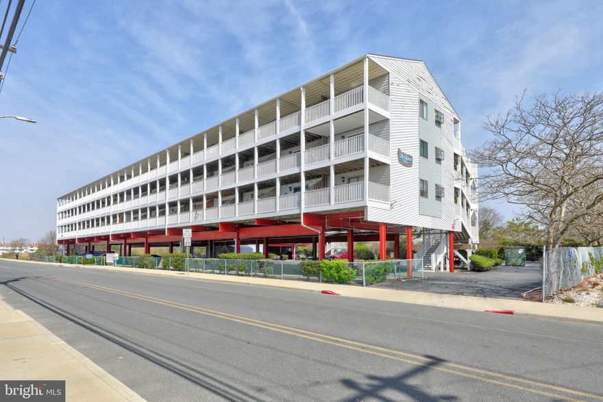 Introducing 300 Robin Drive, Unit 106, a recently updated efficiency nestled within the vibrant Key West Villas community, centrally positioned in the heart of Mid-Town Ocean City. This residence epitomizes the ultimate beach getaway or presents an exceptional investment opportunity awaiting you! Step inside to discover wide plank luxury vinyl flooring, enveloped in a serene palette of light grays and crisp whites, complemented by captivating design elements including a faux-brick feature wall crowned with meticulous molding. The kitchen is a culinary haven, adorned with granite countertops, a charming subway tile backsplash accentuated by decorative tile inserts, and gleaming stainless-steel appliances, all centered around a quaint breakfast bar. The living area seamlessly extends to a generously proportioned covered balcony through sliding doors, offering an idyllic setting for savoring morning coffee, or indulging in evening cocktails. After wrapping up your day's tasks, the desk gracefully transforms into a Murphy bed, ensuring restful repose to recharge for another day of beachside festivities. Completing the ensemble, a well-appointed full bath, a convenient laundry center, and two additional closet spaces cater to your practical needs. Embrace the convenience of being just a leisurely stroll away from both the beach and bay, as well as a myriad of Ocean City's finest restaurants, entertainment venues, and recreational attractions. Don't delay - seize the opportunity to experience coastal living at its finest! Schedule a viewing today and embark on the journey to start living your best life at the beach!