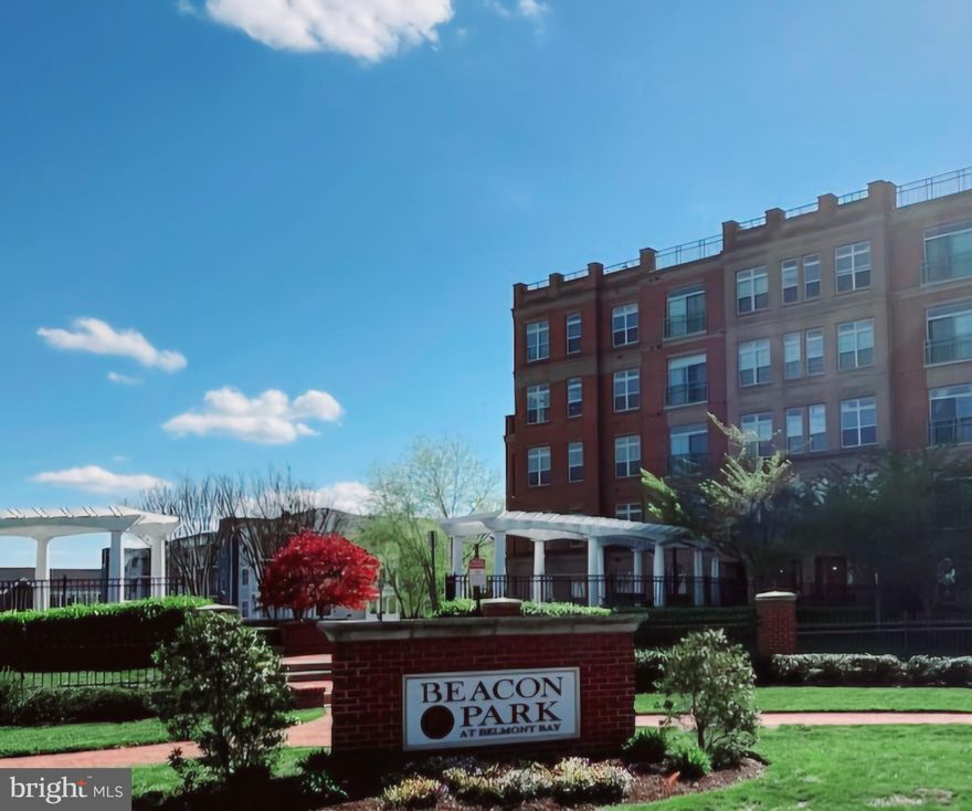 10K in Closing Cost! Welcome to resort style living Beacon Park at Belmont Bay! This beautiful condo has a very large bedroom w/a den combo that can be used as a 2nd bedroom, office/study or separate  Dining Room. It features an open floor plan and a beautiful view of the area. The eastern facing fixed transom windows allows a lot of sunlight to enter the Living Room that illuminates the Living Room, dining & kitchen areas. The gourmet kitchen has lots of 32" cabinets for plenty of space and granite top w/an island facing the window. Come inside the Master suite that has dual walk in closets, luxury en-suite bath that has a soaking tub, separate shower & double vanities. The carpets has been professionally cleaned. The 65" Flat Screen TV w/built in sound system conveys as is. There's a powder room for your guest. You will enjoy the Underground Parking for security and weather protection w/your assigned parking. And last but not least the Rooftop sitting area where you can relax and enjoy the view with your morning coffee or watch the sunsets.. Also an elevator, key fob entry, security cameras, trash chute on each floor, scenic walking paths AND did I mention its near the VRE! See it today!