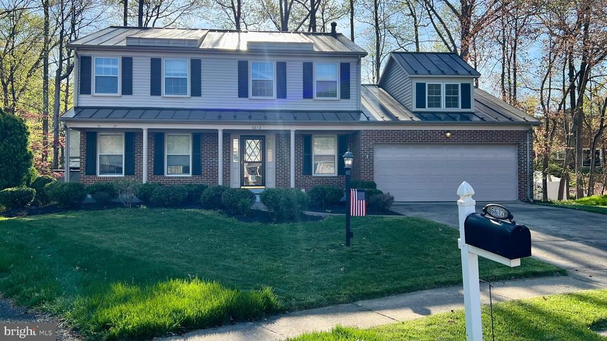 More pictures coming soon. Stay tuned for more details.

Beautiful brick & siding colonial with relaxing front porch on a cul-de-sac backing to trees. One of 10 homes built by Camelot with tile entry foyer, large bedrooms, family room off kitchen, newer counter tops, bay window, large eat in space in kitchen and a wonderful sunroom.  Walk to Elementary School, Library, park & ride, shopping and 15 min to metro.