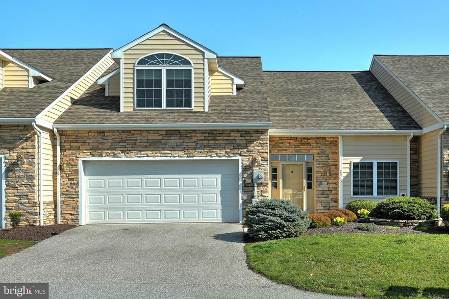 Beautiful,  move in ready condo!!!  Featuring:  Front entry 2 car garage. Kitchen with tile backsplash, granite counter tops, all appliances and a dining area.  Huge Living room with vaulted ceiling, fireplace and sliding glass doors leading out to cozy patio area. First floor laundry with washer, dryer and storage room.  Main floor master bedroom with walk in closet and master bathroom with tile flooring, double vanity, soaking tub and stand up shower.  On the second floor you will find a balcony over looking the Living Room, and  two large bedrooms with carpeting and walk-in closets.  There is also a full bathroom with single vanity and tub shower.   Conveniently located to I-83, Rt-30,  schools, shopping, etc.   Do not let this one pass you by...