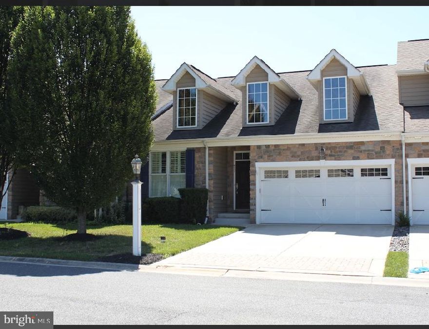 Welcome to this spacious 4-bedroom, 3-bath Clark Turner “Affirmed” Villa, ideally situated on a premium cul-de-sac lot backing to open space and a tranquil pond in the resort-style, gated Bulle Rock community. The main level features an open-concept layout with 11’ ceilings, a stunning groin-vaulted dining room ceiling, a bright and functional kitchen, and a large living area that opens to a private deck—perfect for relaxing or entertaining.

The first-floor primary suite offers a private bath and walk-in closet for your comfort and convenience. One  additional main-level bedrooms and a full bath provide flexible space for guests or a home office. The finished lower level adds two additional  bedrooms, another full bath, and generous recreation space—ideal for a media room, gym, or hobbies.

Enjoy low-maintenance living with a 2-car garage and ample storage. While move-in ready, the home offers a fantastic opportunity to add your personal touch with updates like fresh paint or modern finishes.
Live where you play—Bulle Rock amenities include indoor/outdoor pools, fitness center, tennis courts, walking trails, and more. Schedule your showing today and discover the lifestyle you've been looking for!