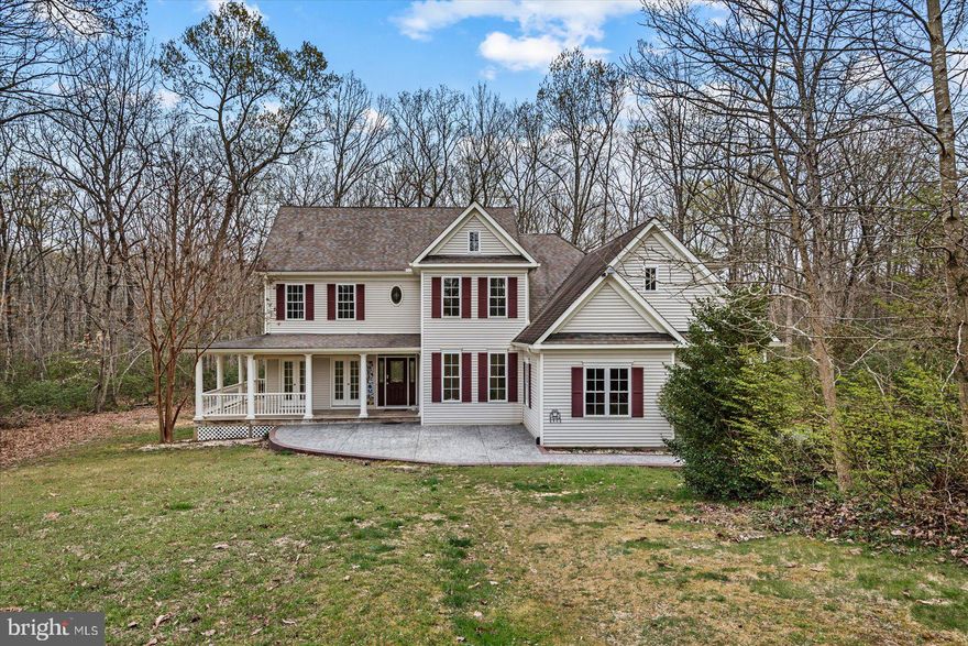 WELCOME HOME to this Beautiful HOME with Detached COTTAGE on 7+ acres in North Stafford.  Lovely Home is Surrounded by beautiful foliage & mature trees providing a PEACEFUL &  SERENE setting.  As you approach  you will find an oversized patio and WELCOMING front PORCH.  This HOME is EVERYTHING you have been seeking – including multigenerational potential. Special features include: Main level OWNERS ENSUITE with Sitting Room, LUX BATh, & WIC.   Three Additional BEDROOMs upstairs with their own Private Baths and large closets.  The Entry level HIGHLIGHTs SPACIOUS kitchen with GRANITE Counters, breakfast area/MORNING ROOM, & beautiful 2 story family room with COZY STONE FIREPLACE.  The open concept and abundance of natural light shines in through the windows.  LOWER LEVEL of the HOME  is finished with full bathroom and private rooms, which can be perfect for guests, au pair, or a child in college.  EXPANSIVE LOWER LEVEL is also an ENTERTAINERS DREAM.   PERFECT place for tv watching, gaming,  home gym, or an office, in addition there is also a nice size storage room.  BUT WAIT.  There is more.  DETACHED COTTAGE is just DARLING.  Oh my.  Perfect for inlaws, College kiddos, or guests.   IMAGINE ending your day in your yard, sitting on your FRONT PORCH,  custom PATIO, or deck  while the SUNSETS among the TREEs. IDEAL location is close to 1-95/HOV/VRE , Stafford shopping centers & Eateries.  Centrally locate to DC or Richmond. FAVORITE this HOME SWEET HOME and schedule your showing today!