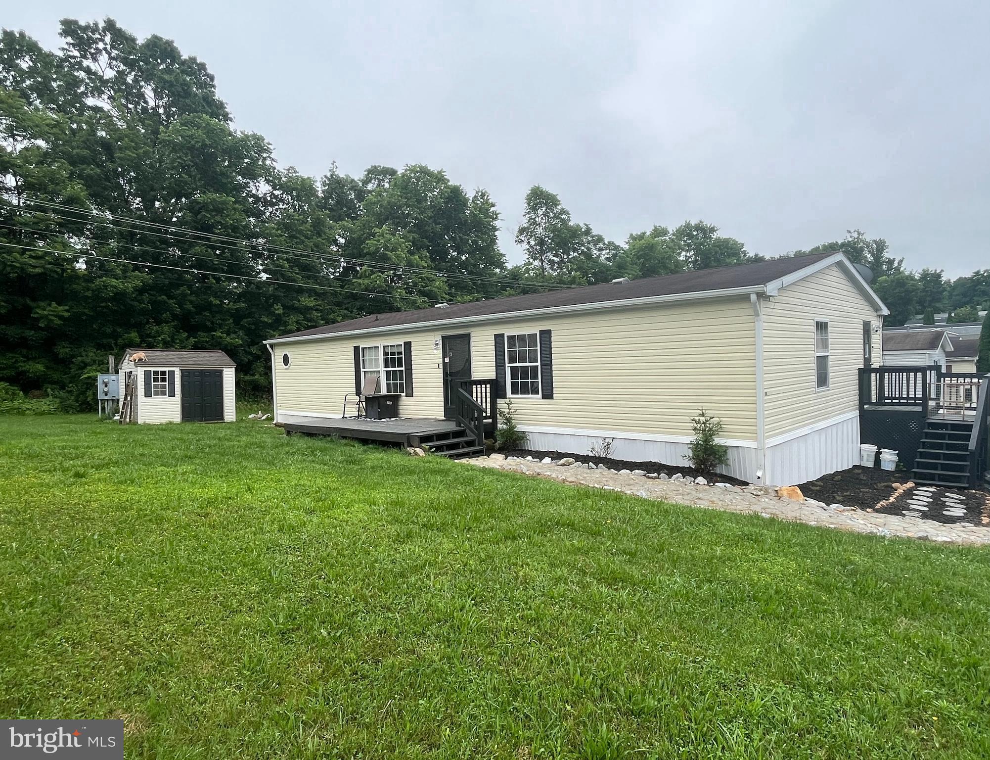 Welcome home to this inviting 3-bedroom, 2-bathroom mobile home located in a desirable gated community. Experience the ease of single-level living and the added security and amenities that come with a private community. It's the perfect spot to unwind and create lasting memories. Lot rent is $485/month (includes water). Park approval required.