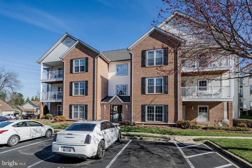 Winifred Manor welcomes you to this well maintained 55+ living condominium.  Featuring two bedrooms with two full bathrooms and updates throughout the past years.  There is a newer stackable washer/dryer and dishwasher.  There is plenty of storage space in the kitchen pantry and cabinets.  The main bedroom with its full bathroom and walk-in closet  has a window with custom window treatment blind for privacy yet allowing light to enter the room. This condominium has the benefit of its parking space right below 8 steps to the private oasis of a back patio for ease with moving in and your future convenience for bringing groceries and hosting visitors.   You can enjoy your cup of coffee or lunch with a light breeze.  You will find social gatherings each month in the Community Club House, it is an easy way to find new friendships.  This is a secure building with an intercom system to allow welcomed visitors through the front door which has a vestibule for your mail and package deliveries.  There is a 2 pet limit with weight restriction of 30#.  No smoking or commercial vehicles and both occupants must be 55+.  The condominium fee includes water/sewer, trash and snow removal.  Reach out with any other inquiries or questions.