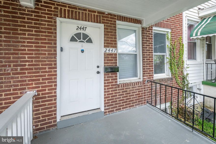 Beautifully renovated interior row home located on a quiet street within walking distance of Westport Elementary School and Florence Cummings Park.  You are welcomed home with a covered front porch and brick front for curb appeal.  Freshly painted with a neutral color palette, vinyl plank flooring for easy maintenance, new windows and doors.  The kitchen features beautiful shaker style two tone cabinets, tile backsplash, granite counters, and stainless steel appliances.  The main level boasts loads of natural light and open floor plan to include a living/dining combination and renovated powder room.  Upstairs are three well appointed bedrooms with fresh paint and neutral carpeting.  The upstairs bathroom has been renovated to include a tile surround tub/shower, modern vanity, and black fixtures to complete the modern farmhouse aesthetic.  The finished basement is a great space for a family room or recreational room.  The basement also includes the laundry room with washer & dryer, as well as storage space and walk out to the rear yard.  Outside enjoy a deck and back yard space ready for your gardening ideas.  Easy access to all that DownTown Baltimore has to offer, as well as 95 and other commuting routes. Make your Pinterest boards a reality with this charming home.