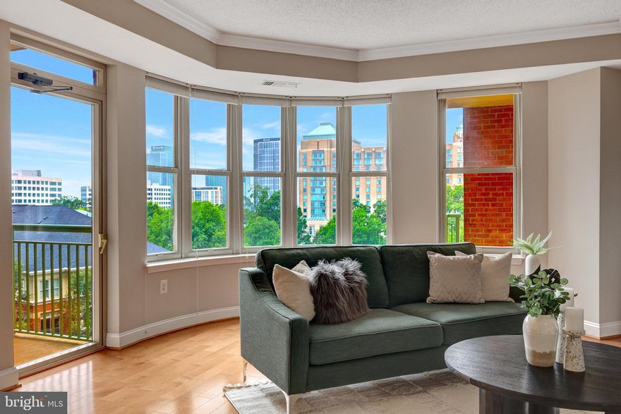 Discover refined condo living in this beautiful two-bedroom, two-bath residence ideally located just minutes from Reston Town Center and the Metro. Offering nearly 1,400 square feet of well-designed living space, this home blends modern updates with everyday comfort, all complemented by picturesque views enjoyed from multiple private balconies with the added bonus of two dedicated interior garage spaces.
<br><br>
This thoughtfully designed split floorplan offers optimal privacy with two spacious bedrooms and two full bathrooms—each featuring generous walk-in closets. The primary suite boasts a private balcony with irresistible views, creating the perfect retreat for morning coffee or evening unwinding.
<br><br>
Inside, tall ceilings enhance the open, airy feel of the living space, which is anchored by a cozy fireplace and accented by rich hardwood flooring for warmth and character. The open kitchen shines with granite countertops, modern cabinetry that provides abundant storage, stainless steel appliances, and a dedicated coffee bar—perfect for daily routines or entertaining guests.
<br><br>
Additional upgrades include a new furnace (2026), newer in-unit washer and dryer, and a recently installed hot water heater for added efficiency. Two assigned garage parking spaces and a private storage unit further elevate the convenience of this home.
<br><br>
The secure, elevator-access building offers a host of amenities, including EV charging stations, a fully equipped fitness center, outdoor pool, community gathering spaces, and concierge service. Centrally located within minutes of top-tier dining, shopping, and entertainment, plus easy access to the Metro for effortless commuting and exploring.
<br><br>
Impeccably maintained and truly move-in ready, this condo offers a seamless blend of style, location, and low-maintenance living. Water and sewer are included in the monthly condo fee.