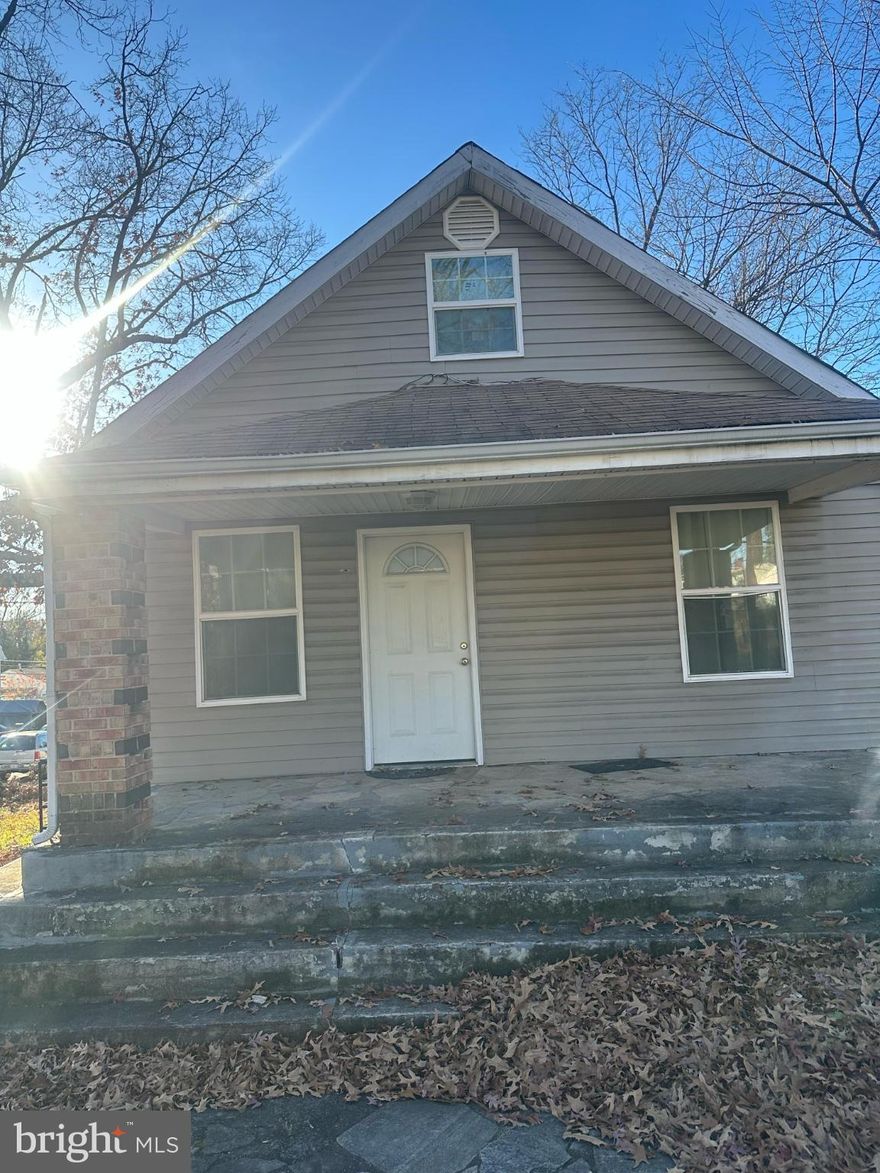 BIG Corner Level Flat Lot.  Fully finished basement with separate entrance.  Ideal for renting basement out to support the buyer's mortgage. Central HVAC.   Gas cooking.  Gas Hot Water Heater.  Hardwood Floors.  Parking in private driveway in the back of the home. Excellent location.  Central HVAC.  Close to DC Federal Job Employment market.