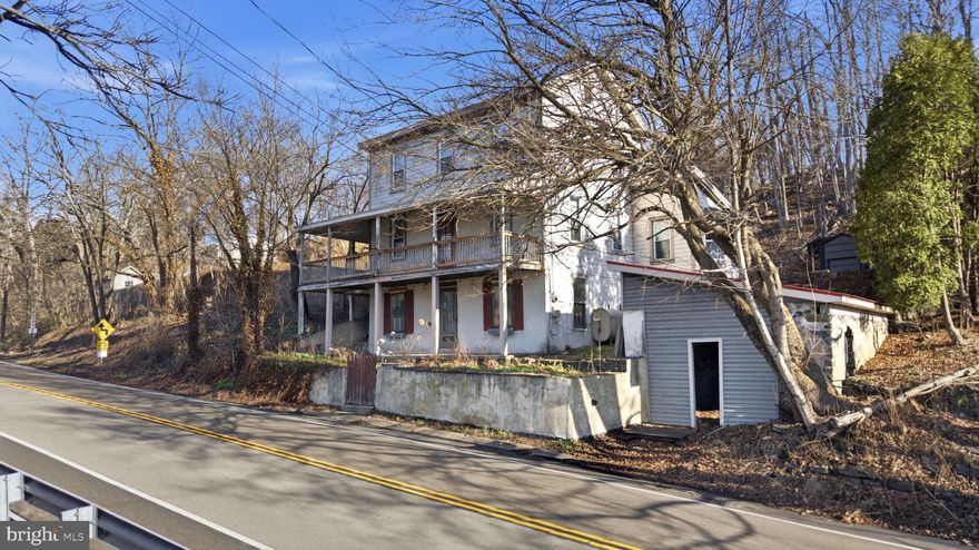 Rare opportunity to own a versatile live/work property with mini-homestead potential on a deep lot offering privacy, usable yard space, and long-term upside. Ideal for contractors, small business owners, hobbyists, or buyers seeking a self-sufficient lifestyle, this property combines residential living with functional land and a large detached workshop.

The main home offers practical living space with room to update and build equity over time. The lot provides open yard areas, wooded backdrop, and space for gardening, animals, or outdoor projects—well-suited for a mini-homesteader looking to create a more independent setup.

A standout feature is the oversized detached workshop, offering flexible space for equipment, storage, projects, or business use—an uncommon asset at this price point. Multiple outbuildings further enhance the property's versatility for tools, supplies, or small-scale agricultural use.

Conveniently located with easy access to major routes and nearby commercial areas, this property offers a unique blend of accessibility and functionality. Whether you're running a business from home, building a small homestead, or investing in a flexible-use property, this is a high-potential opportunity with multiple paths for value.