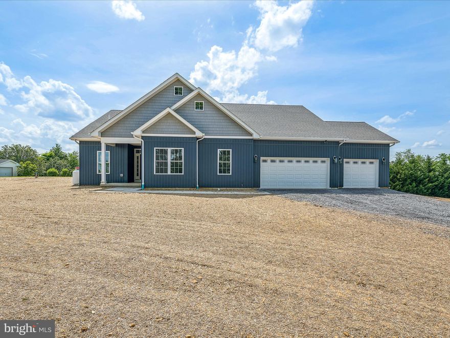 Absolutely Stunning 4 bedroom 2 1/2 bath rancher with attached 3 car garage on 2 acre with full unfinished basement.  Custom wardrobes in primary bedroom closets along with true custom primary bath with modern soaker tub and custom tile shower. This house has amazing curb appeal and will keep your attention throughout house. Don't let this opportunity to own this beauty slip through your fingers.  Book showing today before its gone.