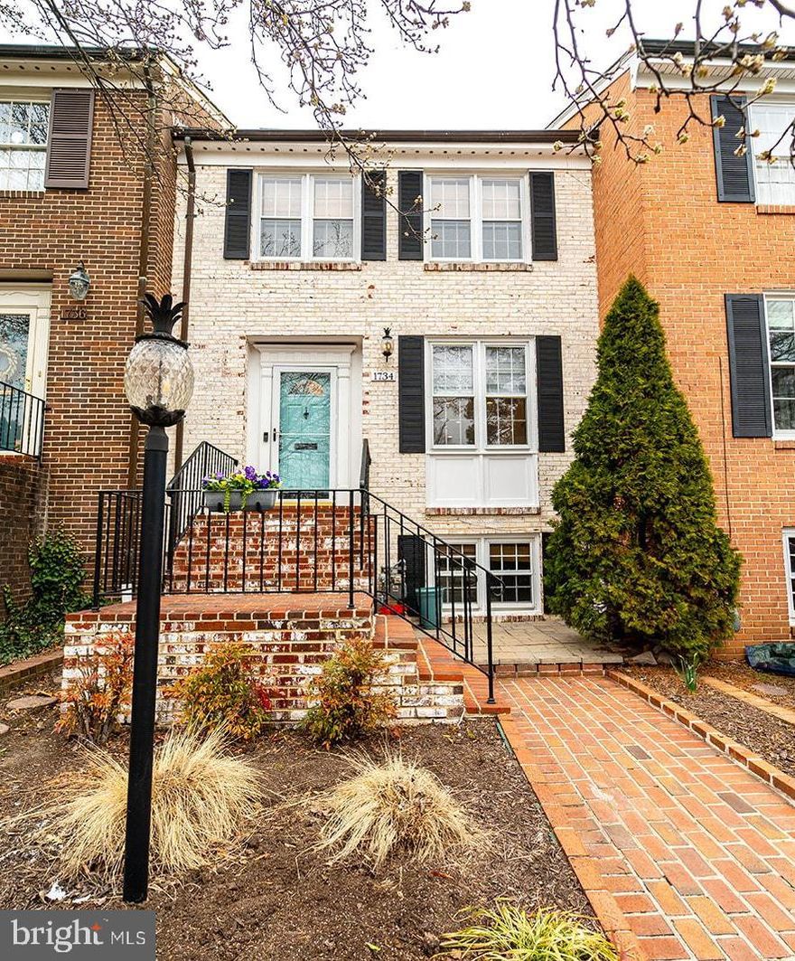Location, Location, Location!  This pristine 3-level townhouse features a large updated kitchen with white and dark cabinetry, beautiful granite, stainless steel appliances. Bright and open living area with oversized windows and gas fireplace. The upstairs includes a spacious primary bedroom with ensuite bath and 2 additional bedrooms and 1 full bathroom. The finished lower level includes a bedroom, full bathroom, large rec room with bar, gas fireplace, Walk-out to a large, private fenced patio with THE COOLEST "Pub Shed" that opens to a bar and is wired for a TV. Perfect for game day Saturday and Sundays. Close to Belle Haven, walk to the Haven, GW Parkway river front parks, Belleview Shopping Center and Old Town Alexandria. Parking on access road in front of property.