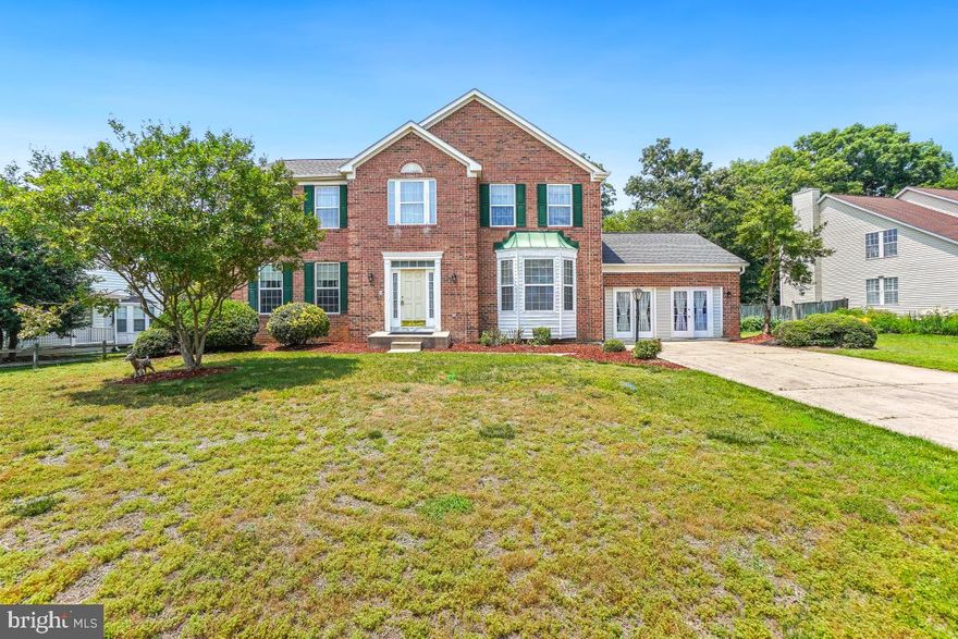 Spacious Brick Front Single Family Home in Waldorf

Welcome to this stunning brick front home nestled on a generous 0.34-acre lot in a peaceful Waldorf community. Boasting over 4,800 square feet of living space, this home offers 4 bedrooms, 3.5 bathrooms, and a layout designed for comfortable living and entertaining.

Step into the grand two-story foyer, flanked by elegant formal living and dining rooms with beautiful wood flooring throughout. The heart of the home is the eat-in kitchen, featuring stainless steel appliances, ample cabinetry, and a center island with breakfast bar seating. The kitchen opens to a spacious family room with a cozy fireplace and flows seamlessly into the bright sunroom with a vaulted ceiling—perfect for enjoying year-round views of the backyard.

From the sunroom, walk out to a large deck overlooking the fully fenced backyard—ideal for relaxing or entertaining. The main level is finished off with a half bath and mud room with washer/dryer hookup and access to the finished garage. The garage adds additional living space and could be easily converted back to a dedicated garage. Upstairs, the expansive primary suite includes a vaulted ceiling, walk-in closet, and a luxurious ensuite bath with a soaking tub and dual sink vanity. Three additional well-sized bedrooms share a full hall bath.

The finished lower level offers incredible flexibility with space for additional bedrooms, a large rec room, a full bath, and a dedicated laundry area.

Located just minutes from shopping, dining, and retail options, with easy access to major commuter routes and transit—this home offers the perfect blend of space, comfort, and convenience.