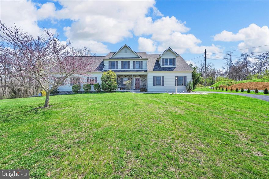 Tucked away on a private cul-de-sac in the desirable Crestwood Estates of Conoy Township within the Elizabethtown School District, 116 Fawn Drive is a truly exceptional custom-built 2011 Colonial set on a breathtaking 3.56-acre lot, offering the perfect blend of elegance, space, and versatility. This stunning two-story home boasts over 3,100 square feet of thoughtfully designed living space, featuring an open-concept main living area with a warm propane gas fireplace that seamlessly connects the living room, dining area, and beautifully appointed kitchen with granite countertops and rich cabinetry, along with a separate formal dining room ideal for entertaining. What truly sets this property apart is the expansive attached in-law or guest suite, a rare and highly desirable feature offering its own private living experience with a full kitchen, family room with gas fireplace, spacious bedroom, full bath, dedicated laundry, and private deck—perfect for multi-generational living, extended guest stays, a private home office retreat, or a comfortable space for long-term visitors while maintaining privacy from the main home. The second floor offers three bedrooms including a generous primary suite with its own bath and walk-in closet, plus a conveniently located second-floor laundry room. Enjoy year-round comfort with central air and  forced air propane heating, and take advantage of the unfinished basement offering endless possibilities for future expansion. Outdoor living is just as remarkable with a welcoming front porch, multiple rear decks ideal for relaxing or entertaining, a peaceful fire pit area, and plenty of room to roam, all complemented by a two-car attached garage and ample driveway parking. With no HOA, private water, public sewer, and an unmatched setting that offers both privacy and convenience, this one-of-a-kind property is a rare opportunity to own a home that adapts beautifully to today’s lifestyle needs while delivering timeless appeal. Home warranty for peace of mind.