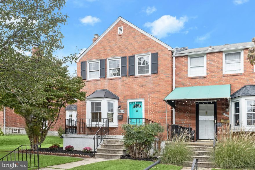 Welcome home to this three bedroom, two bathroom all brick end-of-group rowhome showcasing a freshly painted neutral color palette, hardwood floors, and abundant natural light. As you arrive, a covered front porch and new landscaping create a warm welcome. Inside, the front living room boasts a wood-burning fireplace, recessed lighting, and a bay window. The dining room also features a bright bay window and chair rail detailing. Prepare your favorite meals in the updated kitchen with granite countertops, a tile backsplash, under-cabinet lighting, and stainless steel appliances, including a brand-new dishwasher. Upstairs are the three bedrooms with hardwood floors and a full bathroom with a tiled tub-shower combination. The lower level expands the living space with a recreation room and a second full bathroom featuring a walk-in shower. Completing this level is a large utility room with laundry and storage space. Outside, enjoy the fenced backyard with a patio and lawn. Conveniently located just minutes from several shopping centers, Towson Town Center, Towson University, Goucher College, and quick access to I-695. Some images have been virtually staged.